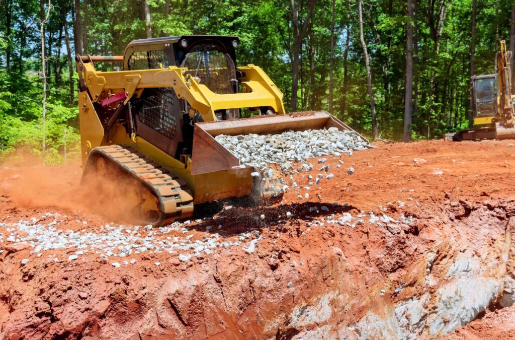 A pleased client observing the professional excavation services provided by Painter Land Development at Lake Keowee.