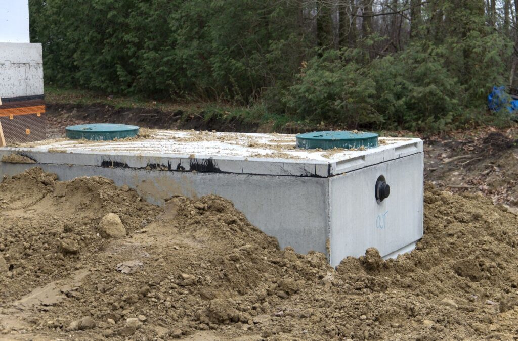 Skilled technician providing septic system maintenance services