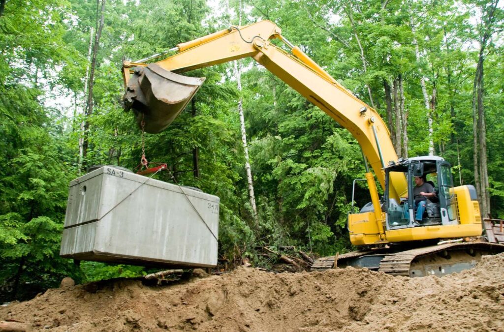 Technicians from Painter Land Development providing efficient septic tank services in Upstate, South Carolina, highlighting their precision and reliability