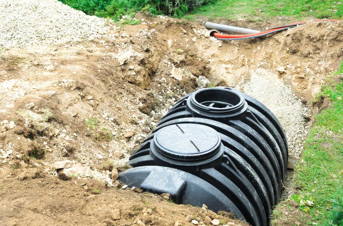 A team member of Painter Land Development performing reliable septic tank installation services in Long Creek, SC.